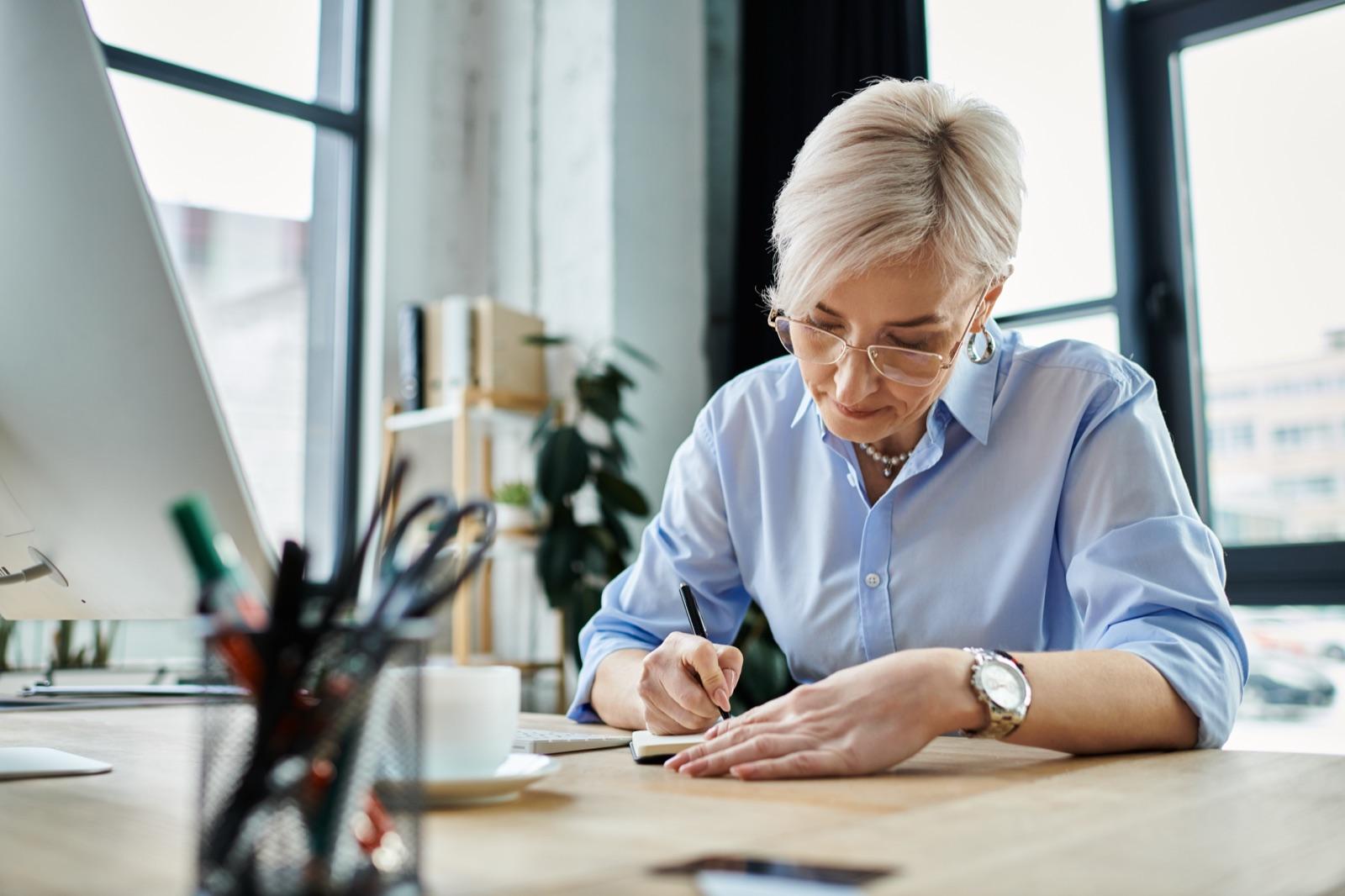 Conveyancing solicitor writing notes